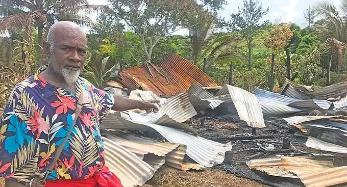 Simione Raiwaileka pointing at the remains of his house at Vuniyalayala, Labasa on December 27, 2022. Photo: Shratika Naidu