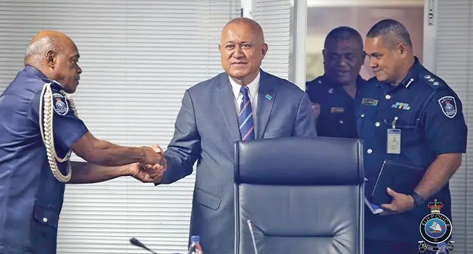 Minister for Policing Ioane Naivalurua greets Assistant Commissioner of Police (ACP) Operations Livai Driu at the Fiji Police Force headquarters in Nasinu on January 13, 2025. Photo: Police Media Cell