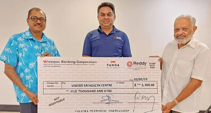 Tanoa Hotels Fiji area general manager, Narend Kumar (left) and the Reddy Foundation Trustee, Shaneel Padarath (middle) handing over the cheque to the Viseisei Sai Health Centre Trust chairman, Rajat Gyaneshwar at the Tanoa Waterfront Hotel in Lautoka on February 3, 2023.  Photo: Nicolette Chambers 