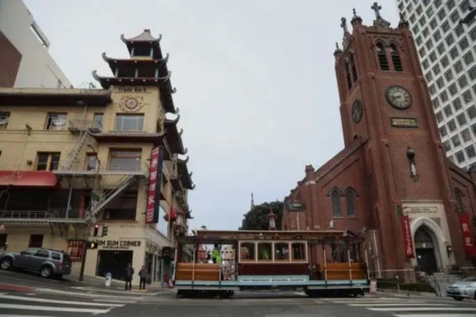 An empty tourist trolley is seen in San Francisco, the United States, March 16, 2020. (Photo by Liu Yilin/Xinhua)