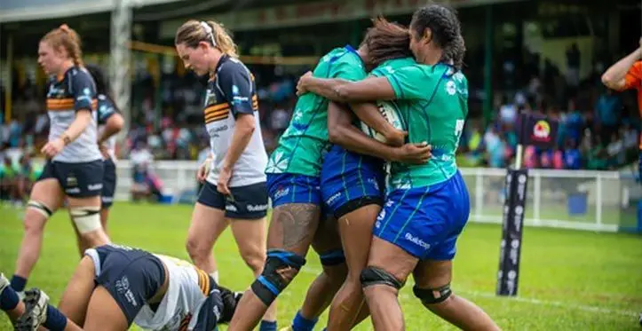 Rooster Chicken Fijiana Drua winger Laisani Moceisawana is mobbed by her team-mates after scoring a try against Brumbies at Prince Charles Park in Nadi on March 25, 2023. Drua won 12-7 as they defend the Super W title. Photo: Leon Lord