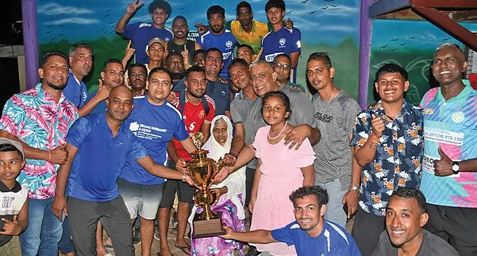 Members of the Nawaka Blues FC with their trophy and fans on September 16, 2024. Photo: Waisea Nasokia