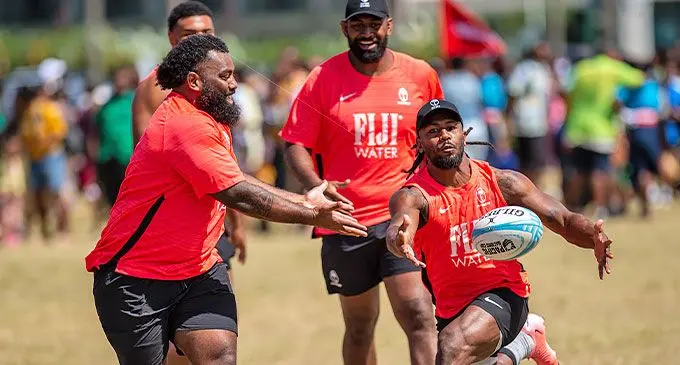 From left: Flying Fijians tighthead prop Samuela Tawake tussels for the ball with halfback Frank Lomani while Isoa Nasilasila(obscured) and Temo Mayanavanua look on during the Captains run at Albert Park, Suva on August 22, 2024. Photo: Leon Lord