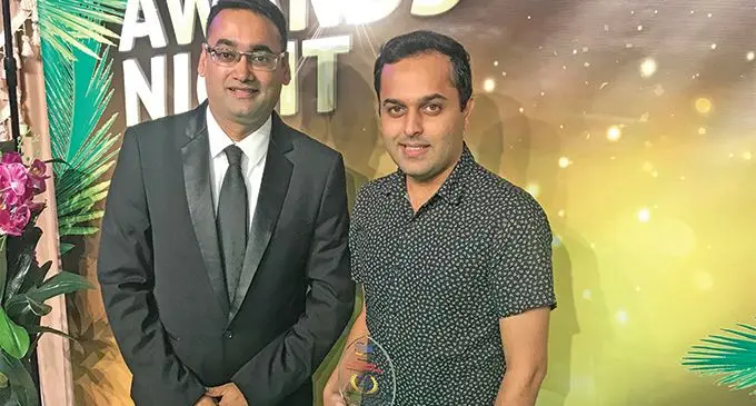 Fiji Revenue and Customs Service (FRCS) Director Revenue Management Fazrul Rahman (left) with Innovation award winner Mohit Kapadia (right) during the inaugural FRCS annual awards night at the Central Cuisine Restaurant and Events Centre – Laucala Bay (Sports City Complex) on April 12, 2019. Photo: Maraia Vula