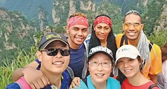 Remo Cevalawa with university colleagues in China.  