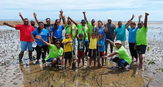 The children of Natabua Seaside join the members of the Rotary Club of Lautoka and the Ministry of Forestry plant mangroves in Lautoka on September 10, 2022. Photo: Nicolette Chambers