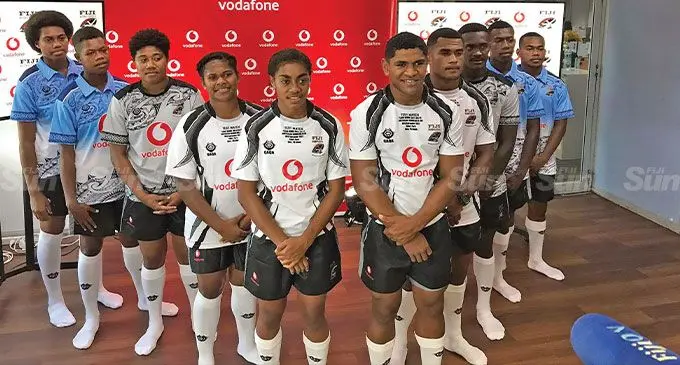 Fijian Schools girls captain Ruth Raketekete (fifth from left) and schoolboys capatin Tomasi Seru (sixth) with some team members during their jersey presentation at the Vodafone headquarters in Tamavua, Suva on September 27, 2022. Photo: Sereana Salalo