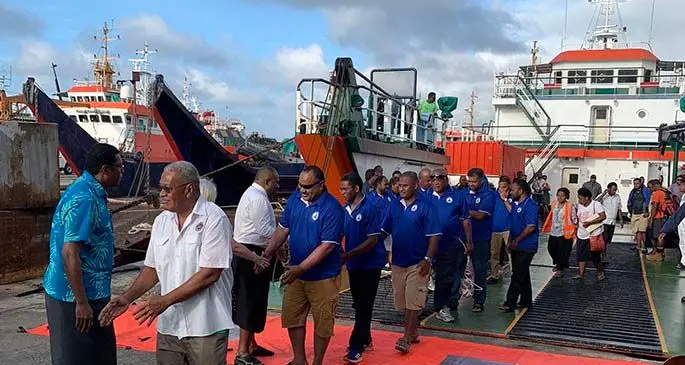 Minister for Health and Medical Services, Dr Ifereimi Waqainabete (left, in black sulu and white shirt) greets his team and officials upon their return from Kadavu as they disembark the MV Veivueti at the Government Shipping Services jetty in Walu Bay, Suva. Photo: Ministry of Health and Medical Services