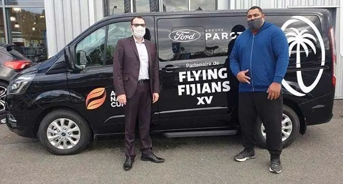 Former Flying Fijians No.8 Sisa Koyamaibole (right) with the vehicle to support our Flying Fijians in France as they prepare for the Autumn Nations Cup that starts next month.