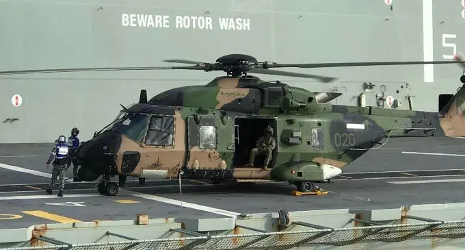 Australian Defence Force helicopter on the deck of the HMAS Adelaide outside the Port of Suva on November 22, 2019..  Photo: Wati Talebua