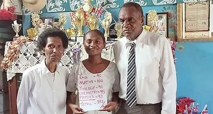 Adi Litia Matamalumu is flanked by her parents Mereani Vada and Ratu Kailiova Maya.