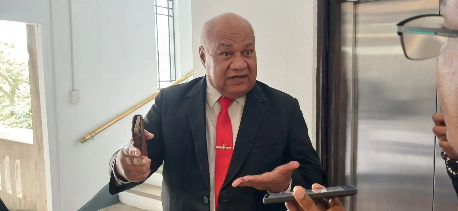 Chief Justice Salesi Temo speaking to reporters outside his chambers in Suva.