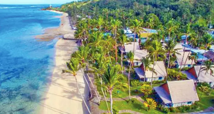 Aerial view of Fiji Hideaway Resort and Spa beachfront villas in Coral Coast.