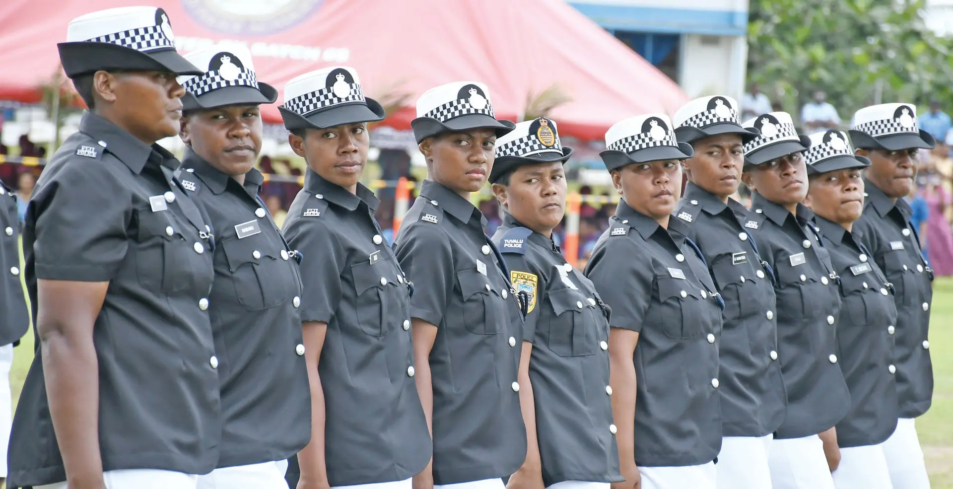 Police Constable Luiseini Cagica, sixth from left, with comrades during the passing-out parade at Nasova grounds in Suva on December 19, 2025. 