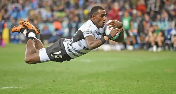 Fiji Airways Fijian Sevens utility back Filipe Sauturaga dives over to score the fourth try against the All Blacks Sevens side during the Rugby World Cup Sevens final at Cape Town Stadium, South Africa, on September 12, 2022. Fiji won 29-12 while Sauturaga was later named the Greatest Player of the World Cup Final. Photo: AFP