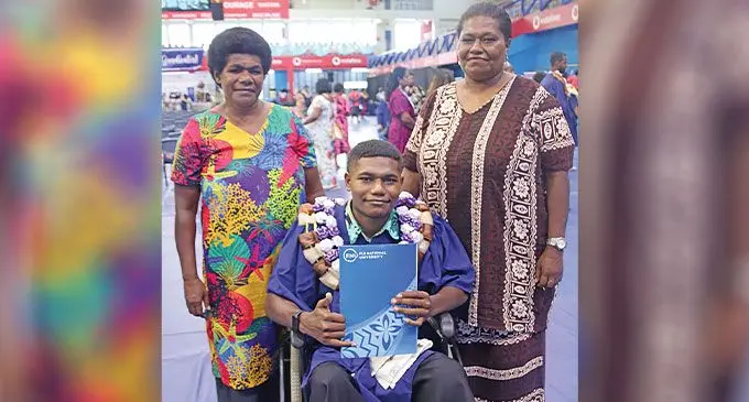 Graduate Sitiveni Naqica(middle) flanked  by his aunt, Siteri Naqari (left) and mother, Kasalaini Lewadali (right) at the Vodafone Arena in Suva on April 17, 2024. Photo: Kelera Tuisawau.