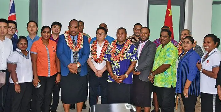 Ministry of Education deputy permanent secretary Timoci Bure (in blue coat), with delegates. Photo: Waisea Nasokia