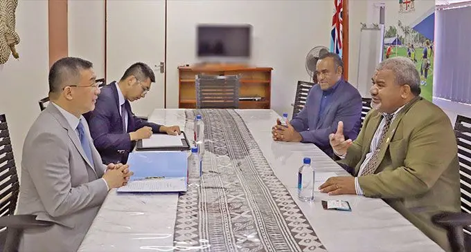 Chinese Ambassador to Fiji, Zhou Jian, (left), with Minister for Youth and Sports, Jese Saukuru, (right) and Permanent Secretary for Youth and Sports, Rovereto Nayacalevu, during a courtesy visit this week. Photo: DEPTFO News