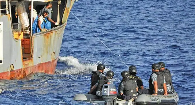 Members of the Royal Fiji Military Forces Naval Division on their way to inspect a fishing vessel as part of the Tui Moana operation in the Suva Harbour