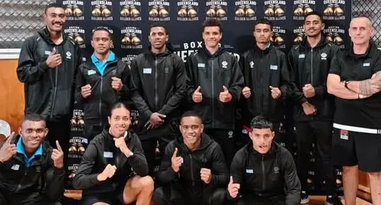 Aminiasi Saratibau (front first from left) with teammates and coach Cam Todd (back first from right) in Australia. Photo: Fiji Amateur Boxing Association.        