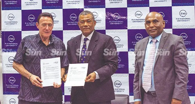 Fiji Airways chief executive officer, Andre Viljoen, FNU Acting Vice-Chancellor, Dr William May, FNU Dean for the College of Business, Hospitality and Tourism Studies, Professor Arun Elias, at the Namaka Campus in Nadi on June 24, 2022. Photo: Nicolette Chambers