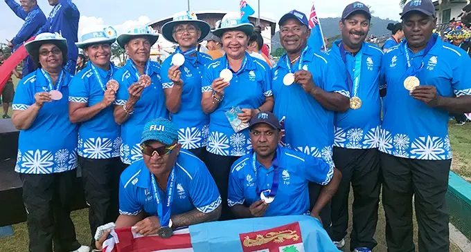 From left; Radhika Prasad, Loretta Kotoisuva, Doreen O’Connor, Sheryl Mar, Litia Tikoisuva, Semesa Naiseruvati, Abdul Kalim and Kushal Pillay. Kneeling from left; David Aitcheson and Rajnesh Prasad. during the Pacific Games in Apia, Samoa on July 10, 2019. Photo: Anasilini Natoga