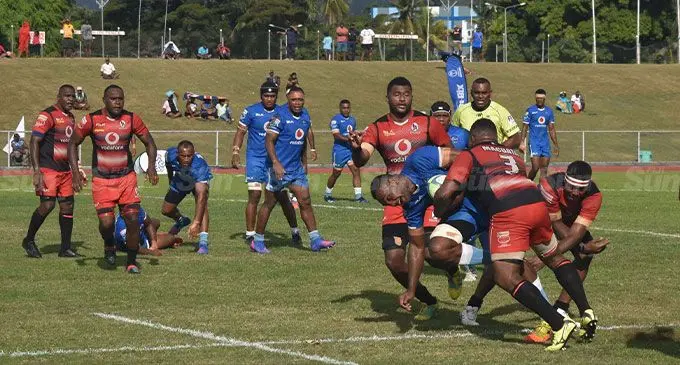 Photo caption: Yasawa’s Manasa Vatanitawake is nabbed by the Macuata players at Churchill Park, Lautoka, this afternoon. Photo: Waisea Nasokia