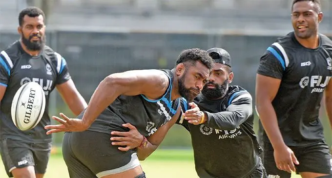 Tevita Cavubati fires a pass during the Fiji Airways Flying Fijians captain’s run as Dominiko Waqaniburotu, Nikola Matawalu, Vili Mata look on at Albert Park, Suva on August 9, 2019. Photo: Ronald Kumar