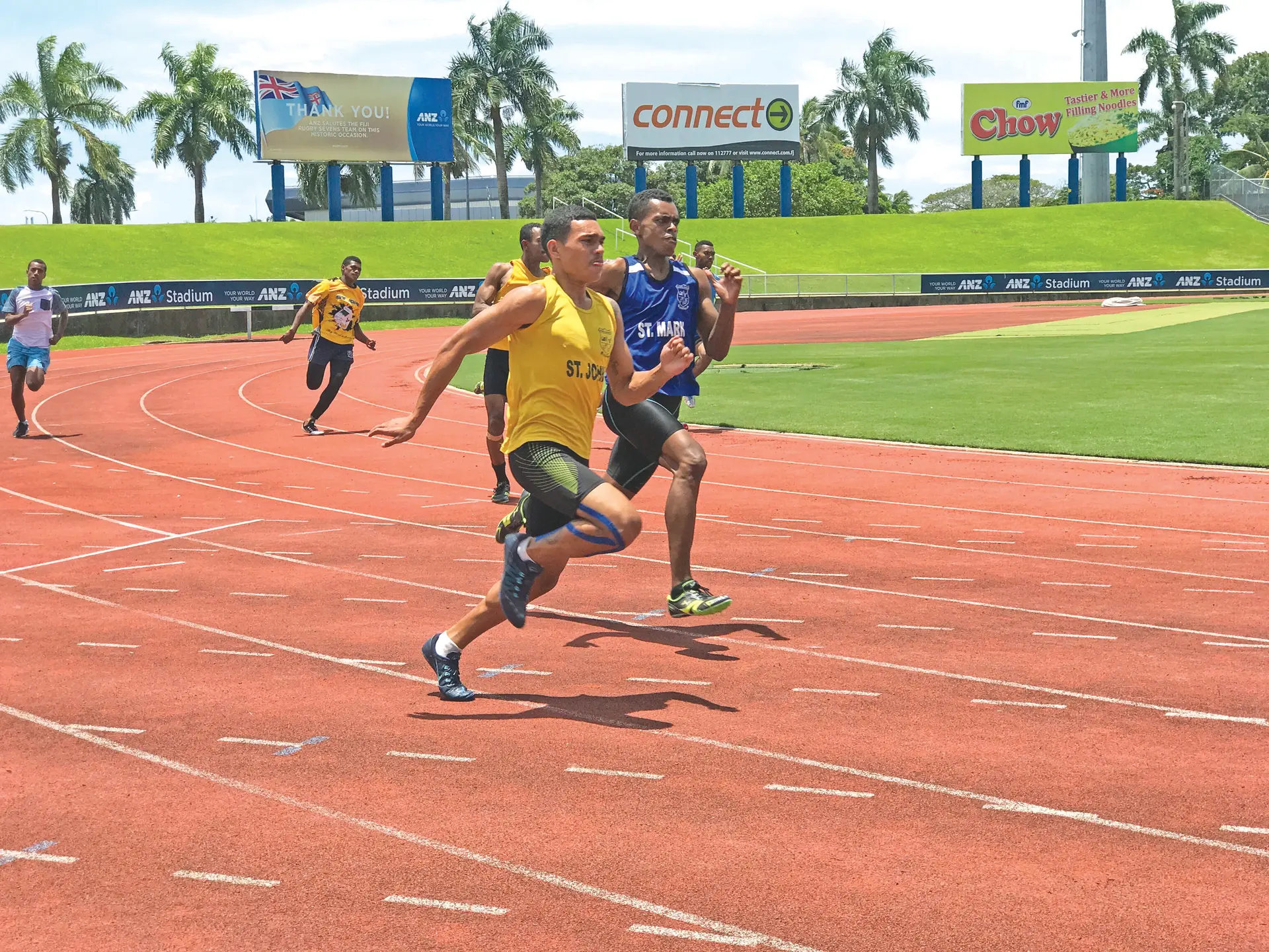 Nathan Vakakuruivalu (yellow) in action during the senior boys 200m heats at the ANZ Stadium, Suva on February 15, 2018.  Photo:  Grace Narayan