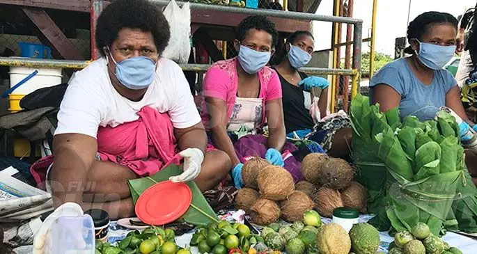 Market vendors with their protective gear as they sell their produce at the Labasa Market on March 27, 2020. Photo: Laisa Lui