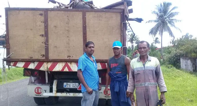 Company director, Elvin Kumar (left) with Nasinu Town Council workers. Photo: Lusiana Tuimaisala