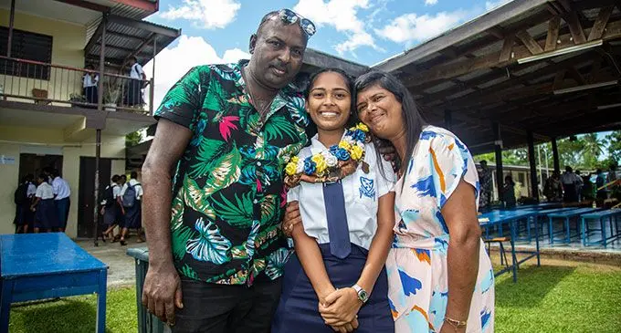 Nakasi High School head girl Rajnita Goundar (middle) flanked by her parents Rajnesh Goundar and Sanita Wati in Nakasi on 22 April 2022. Photo: Leon Lord
