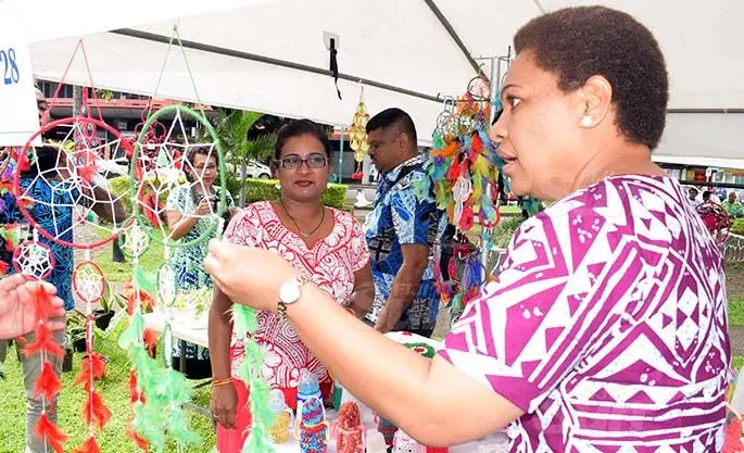 Amrita Nand 33 with some of her hand made products on sale with Womens Minister Meresaini Vuniwaqa during Open Market Day at Ratu Sukuna Park on August 7, 2020. Photo: Ronald Kumar.