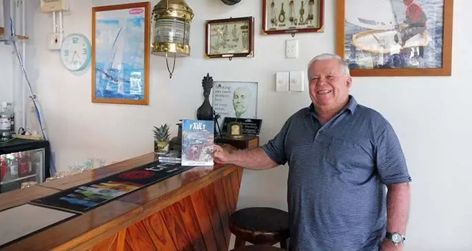 Geoffrey Taylor of Savusavu with his book Not My Fault.