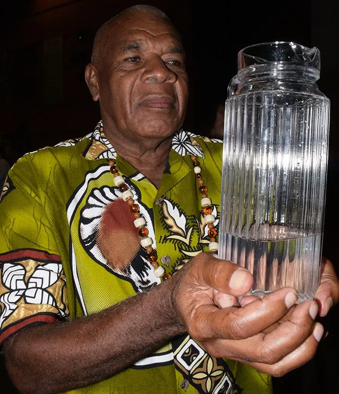 Eroni Koroiwaca, headman of Nakini Village, Naitasiri, shows clean drinking water from the village during the opening of the Ecological Purification System (EPS) Public Seminar at University of South Pacific on March 12, 2019. Photo: Ronald Kumar