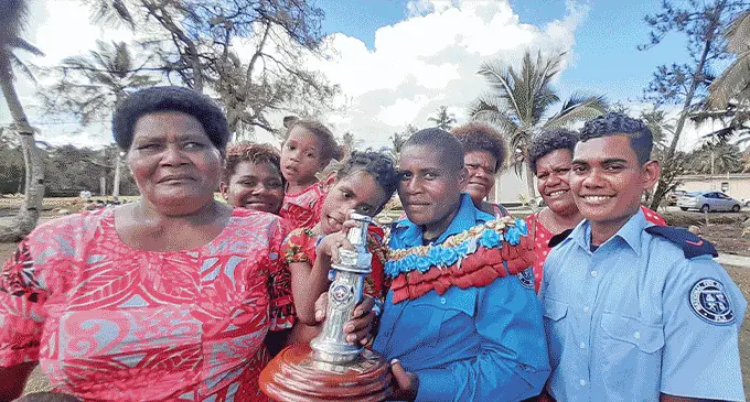 Nunia Kawa carrying her daughter Sera Serea Senikau with family during the NFA 2023 Firefighter Recruits passing out parade at the Republic of Fiji Military Forces Navy Togalevu Base on April 26, 2023. Photo: Wati Talebula-Nuku