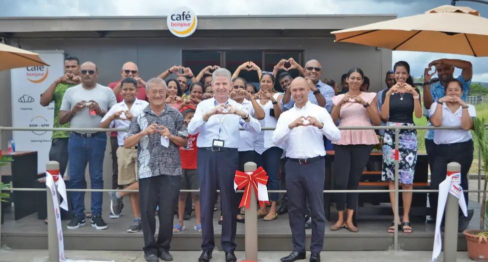 Mehmet Celepoglu, Vice President, TotalEnergies Oceania and South East Asia (front-middle) with Dennis Cuaycong, managing director of TotalEnergies Marketing Fiji (front-right), Station Dealer -Philp Gock (right), Staff, invited partners and employees during TotalEnergies Navutu Bonjour Café  inauguration. Photo: TotalEnergies Marketing (Fiji) Pte Ltd