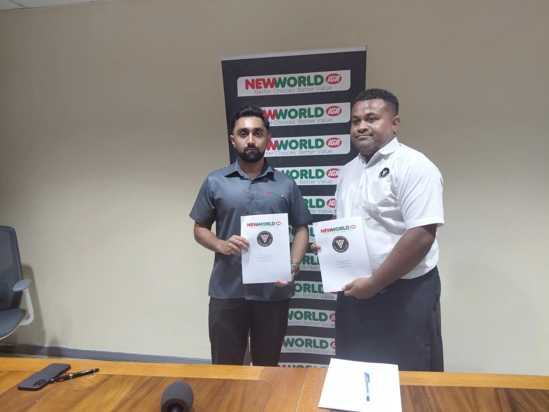 Sameer Patel, Head of Merchandise, Marketing and Wholesale at NewWorld IGA and Taraiasi Wara, director of Unravel Viti, during the signing ceremony at NewWorld IGA Distribution Centre in Vatuwaqa on November 13, 2025.