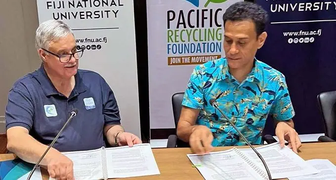 From left: Professor Roland Demarco of the Fiji National University’s Research and Innovation, with Waste Recyclers Fiji Ltd director Joseph Deo during the signing.  Photo: WRFL 