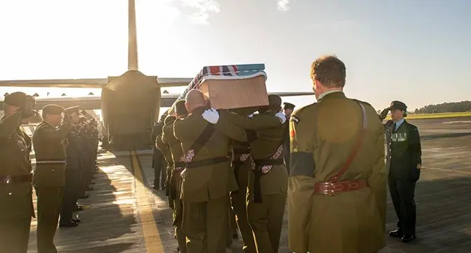 Casket of the late WO1 Vatoga being carried onto the Royal New Zealand Air Force aircraft by pall bearers from the New Zealand Defence Force on Wednesday 02 June, 2021.