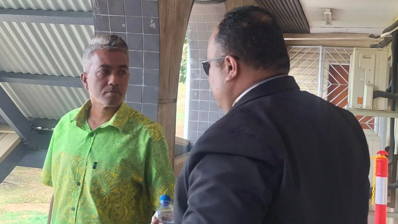 Accused Daniel Prasad (left) arrives at the High Court in Lautoka with his lawyer, Edwin Wainiqolo.