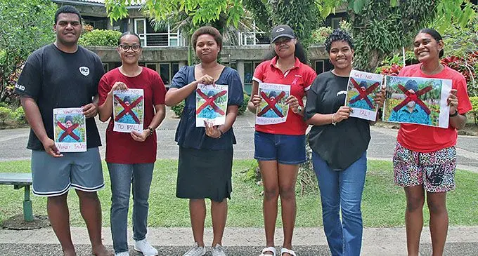 University of the South Pacific students with their placards on October 22, 2024. Photo: Beranadeta Nagatalevu