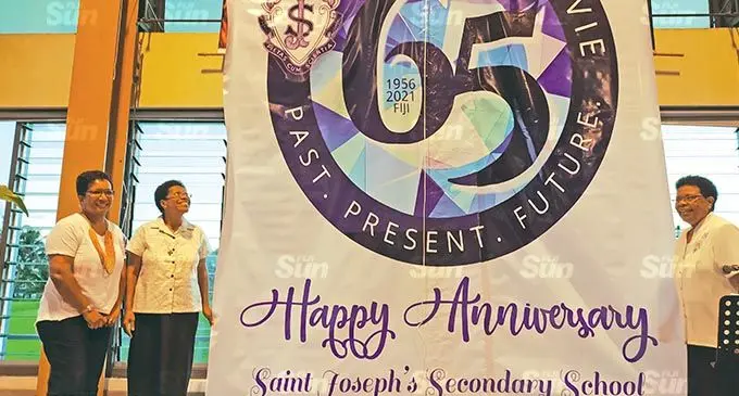 (From left) Saint Joseph’s Secondary School alumnae president Pule Sukanaivalu, Sr Lusiana Matai and Sr Ana Rarasea unveil the school’s sapphire anniversary logo on November 13, 2021.  Photo: Ivamere Nataro