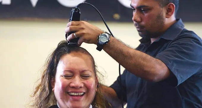 Ana Suliano gets her hair shaved as part of WOWS kids Fiji shave or save campaign. Photo: Ronald Kumar