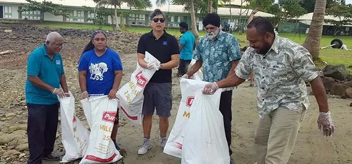 European Union ambassador Sujiro Seam (third from left), University of the South Pacific vice-chancellor Professor Pal Ahluwalia (fourth from left) and Fiji Sun columnist AnnMary Raduva (second from left) with USP staff, students and activists to mark World Environment Day and International Oceans Day with a cleanup at the university foreshore in Suva on June 5, 2020. Photo: USP