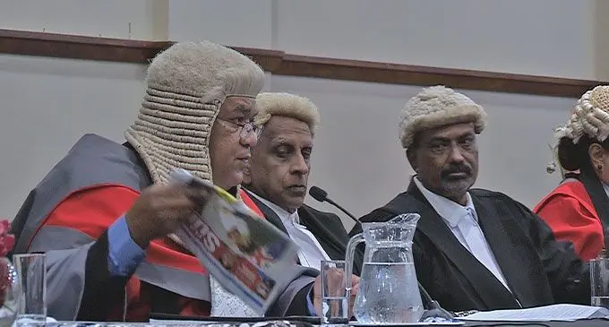 Acting Chief Justice Salesi Temo speaking to the newly admitted lawyers about the Fiji Sun front page story of March 17, 2023 on former Electoral Commissioner Suresh Chandra who was deemed unfit to practice as a lawyer by the Independent Legal Service Commission, during the Admission to the Bar at Grand Pacific Hotel in Suva on March 17, 2023. Photo: Judiciary Fiji