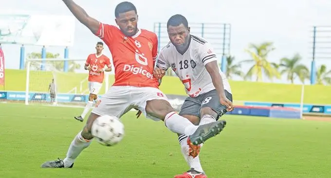 Rewa Captain Setareki Hughes and Laisenia Naisoko of Suva battle for possession during their first match of the Digicel Premier League at ANZ Stadium, Suva, on March 7, 2021. Suva defeated Rewa, 1-0. Photo: Ronald Kumar