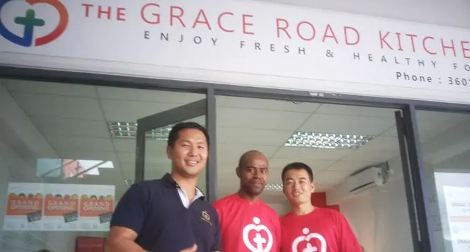 Grace Road Group managing director Daniel Kim with staff outside their restaurant at RB Patel Harbour Point Complex .  Photo: JONA KONATACI