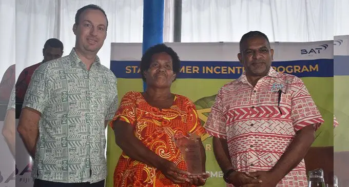 From left: British American Tobacco Fiji general manager Damian Bruty, British American Tobacco (BAT) Star Farmer Alisi Mereleki and Minister for Commerce, Trade, Tourism and Transport Faiyaz Koya during the awards at the BAT complex in Nadi on April 20, 2022. Photo: Waisea Nasokia