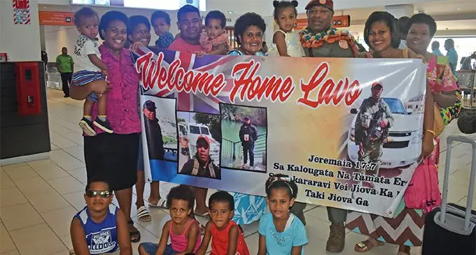 RFMF Lance Corporal Serumaia Bose with his family at the Nadi International Airport on March 22, 2019. Photo: Nicolette Chambers